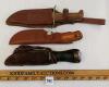 LOT OF 3 - REMINGTON & PAKISTAN KNIVED W/ LEATHER SHEATHS
